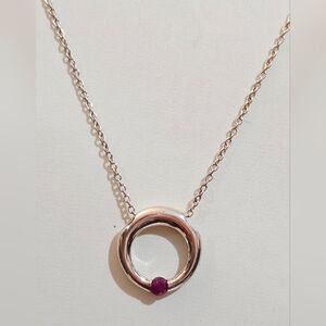 Elegant Silver Necklace with Purple Accent